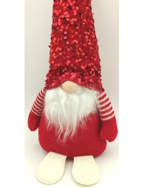 Manó flitteres sapkában