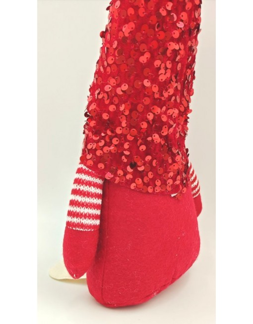 Manó flitteres sapkában