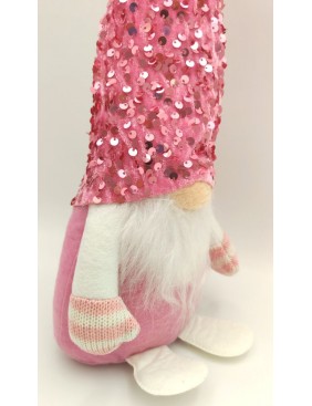 Manó flitteres sapkában