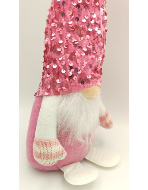 Manó flitteres sapkában