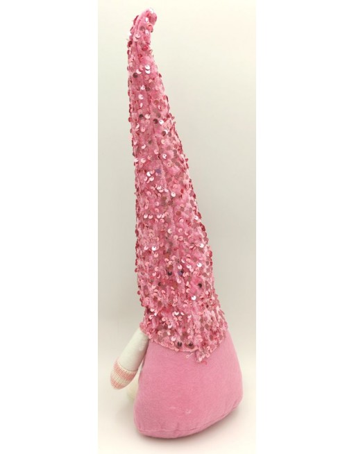 Manó flitteres sapkában