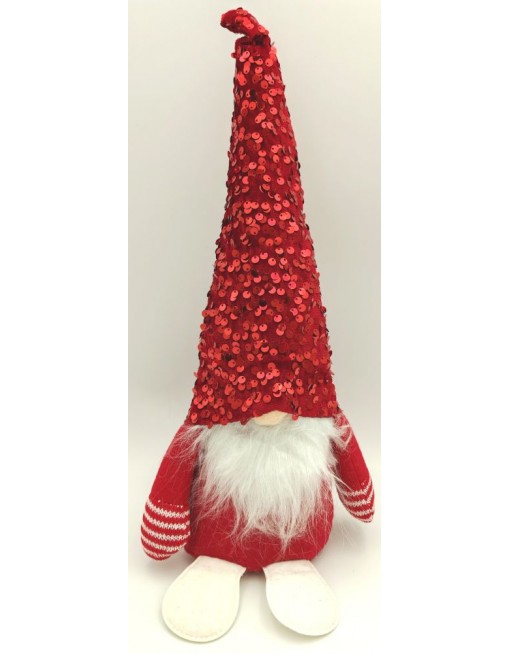 Manó flitteres sapkában