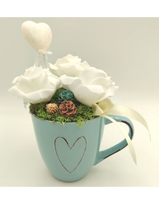 Világoskék díszített bögre